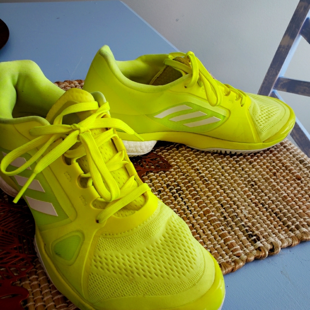 Neon yellow tennis shoes